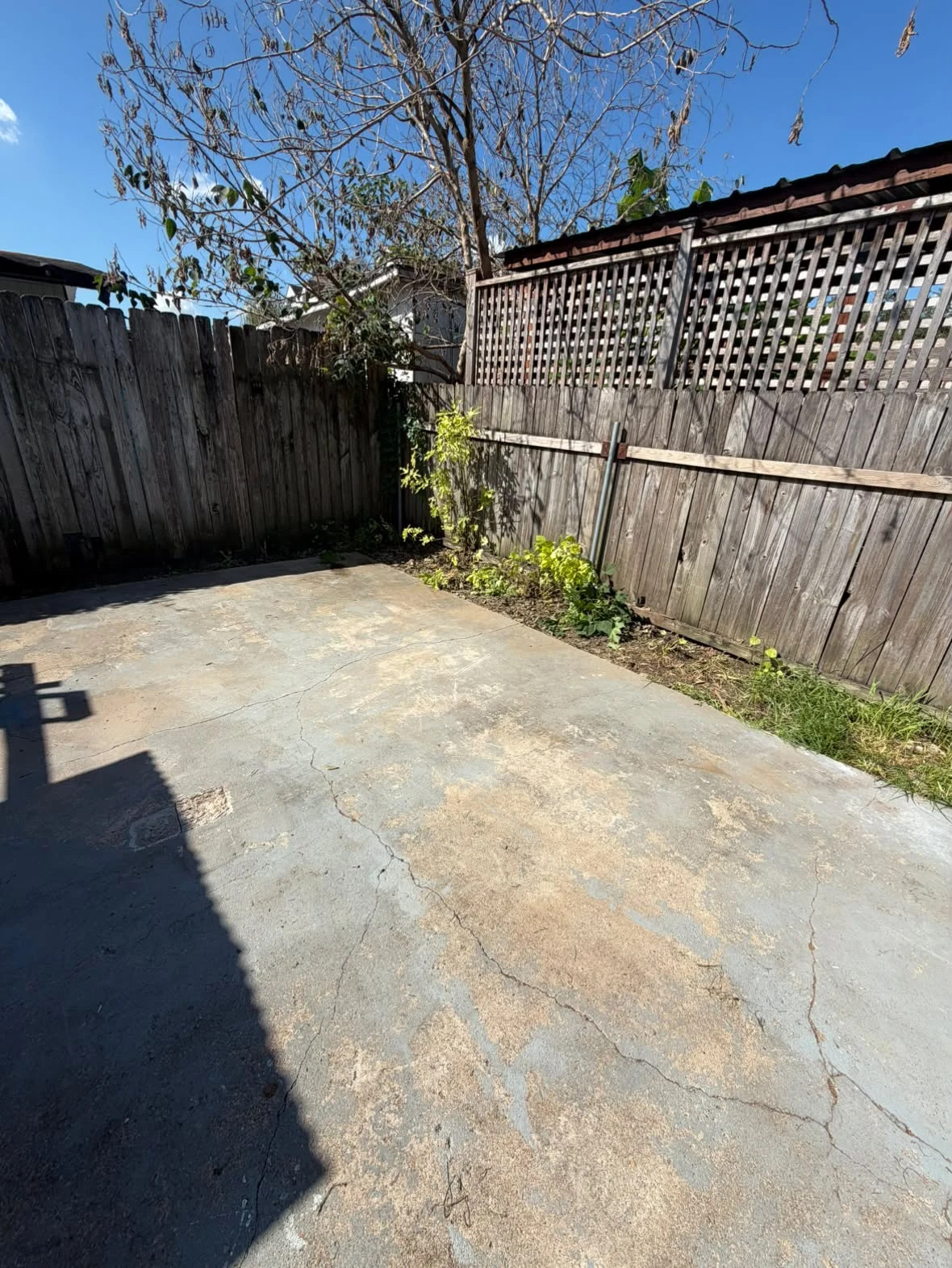 Cleared backyard patio after 005 Haul removed the debris